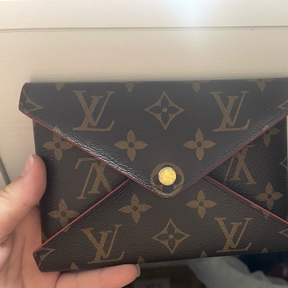 Authentic LV kirigami medium pouch